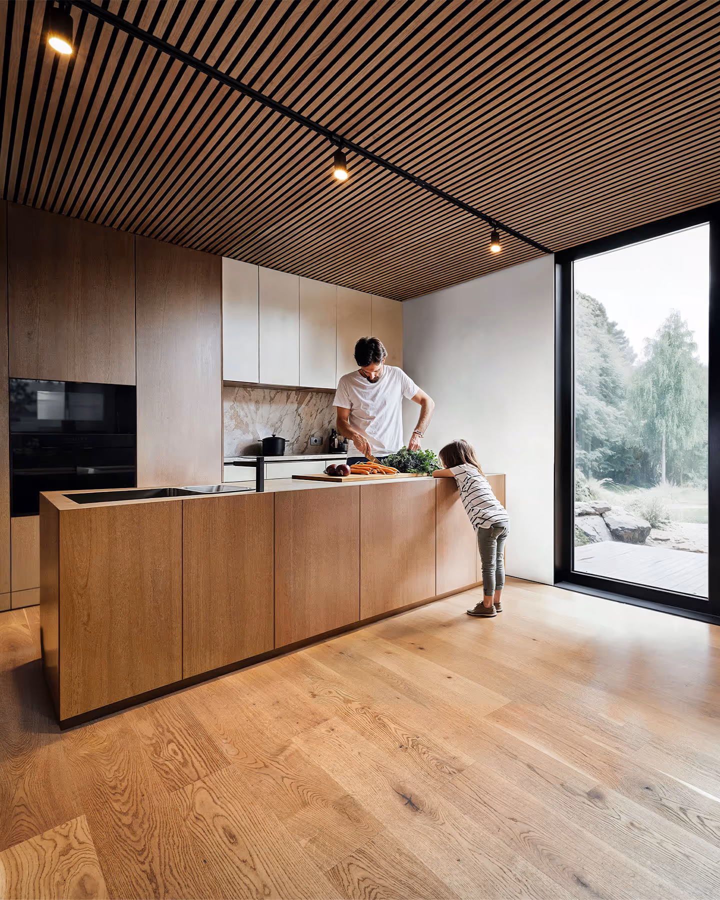 A happy family in a BIOBUILDS modular home.